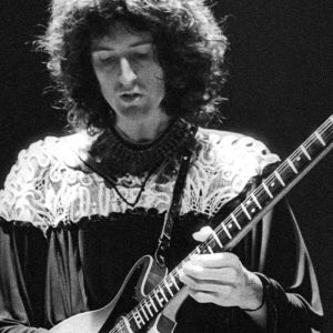 Brian May playing guitar