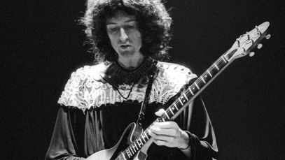 Brian May playing guitar