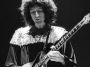 Brian May playing guitar