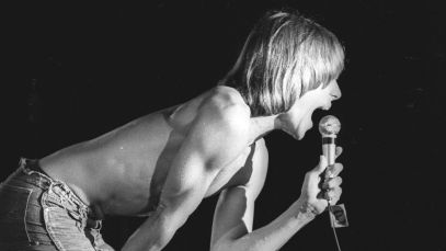 Iggy Pop screaming into microphone