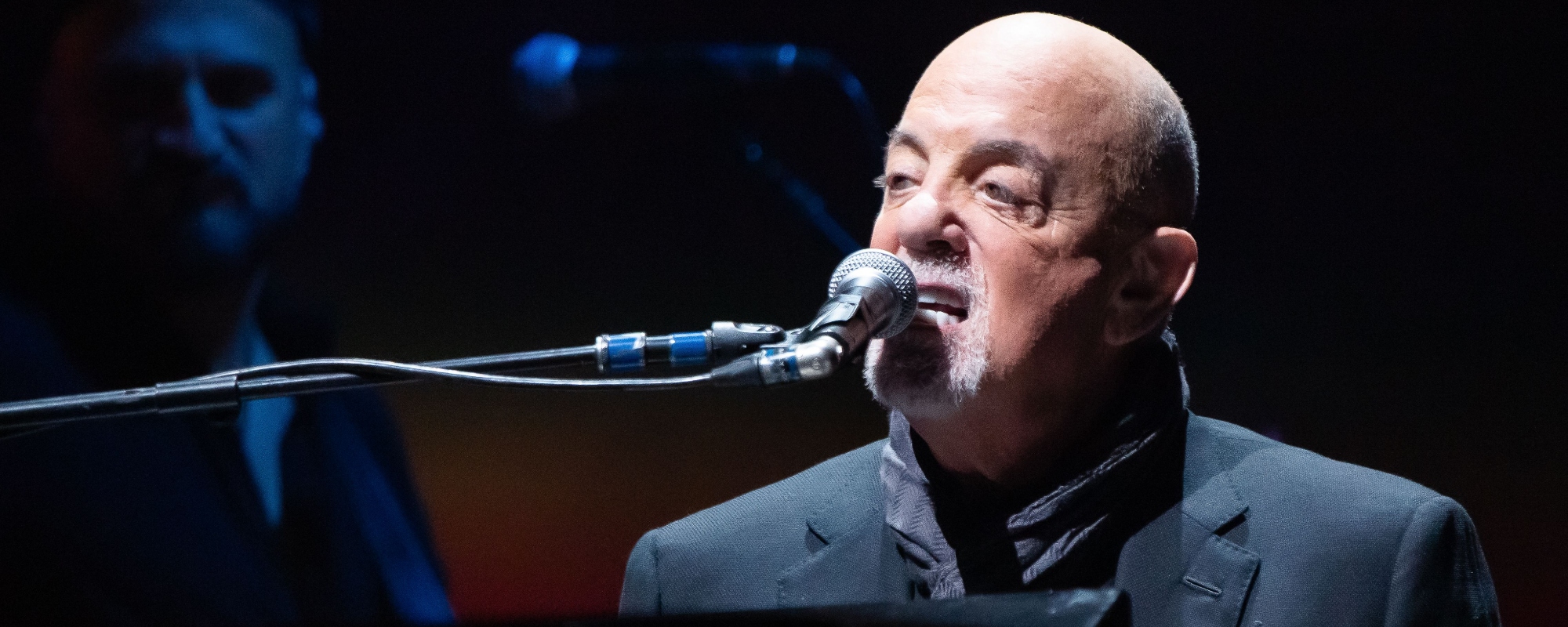 Billy Joel Discusses Fan Theory That “Piano Man” Takes Place in a Gay Bar