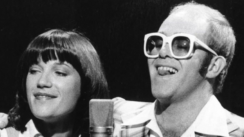 On This Day in 1976: Elton John and Kiki Dee’s Classic Pop Duet “Don’t Go Breaking My Heart” Hit No. 1 on the Hot 100