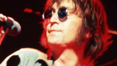 John Lennon performing
