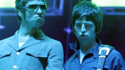 Liam and Noel Gallagher on stage