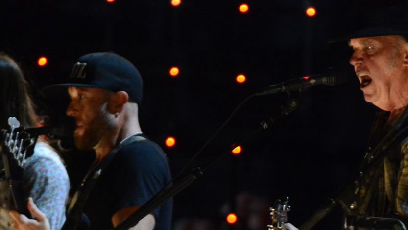 Neil Young and Promise of the Real performing