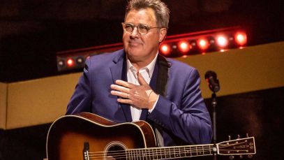 Vince Gill touching chest