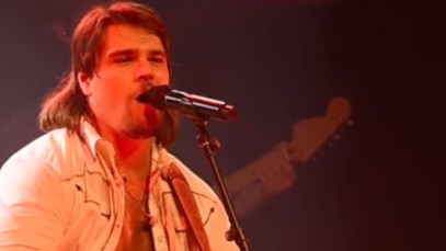 Watch Country Singer Tell Security to "Get The F– Out Of Here" After Punching Fan