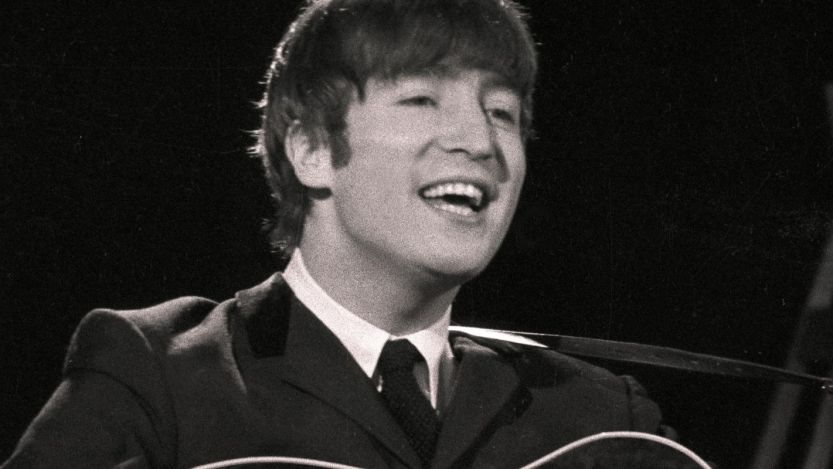 John Lennon performing