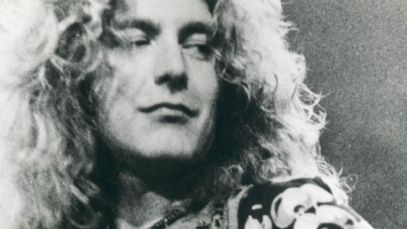 Robert Plant looking off to one side