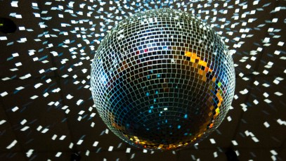 disco ball with lights hanging from ceiling