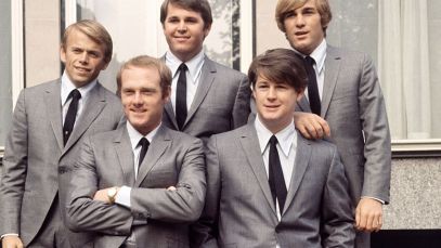 Beach Boys pose in suits
