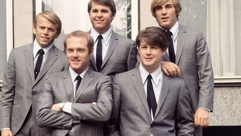 Beach Boys pose in suits
