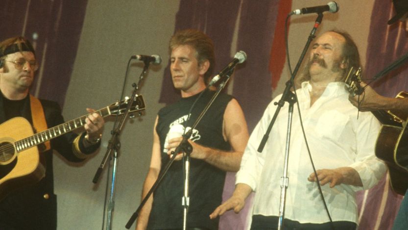 Stephen Stills, Graham Nash, David Crosby, and Neil Young performing