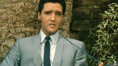 Elvis Presley playing guitar