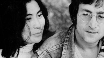 Yoko Ono and John Lennon sitting together