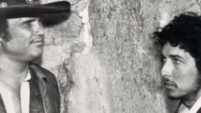 Kris Kristofferson and Bob Dylan on movie set