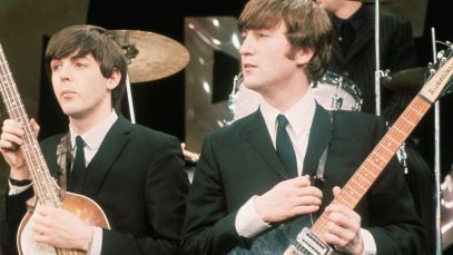 Paul McCartney and John Lennon performing