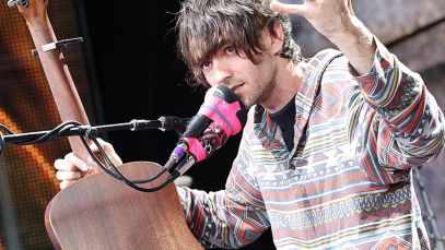 Micah Nelson talking into microphone