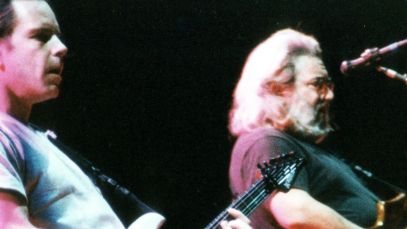Bob Weir and Jerry Garcia performing