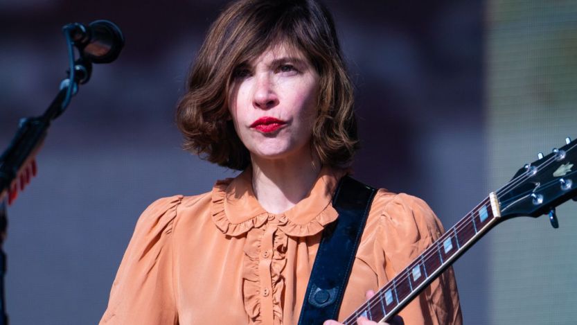 Carrie Brownstein playing the guitar