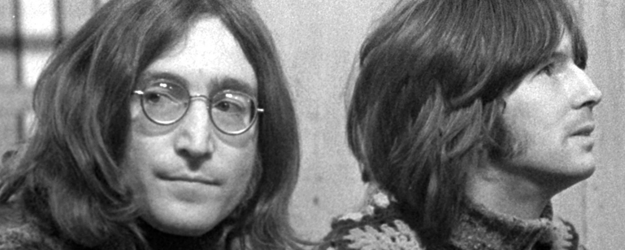 John Lennon and Eric Clapton sitting together