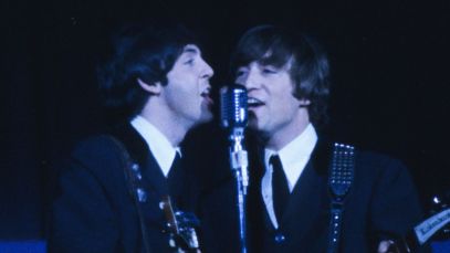 Paul McCartney and John Lennon performing