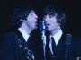 Paul McCartney and John Lennon performing