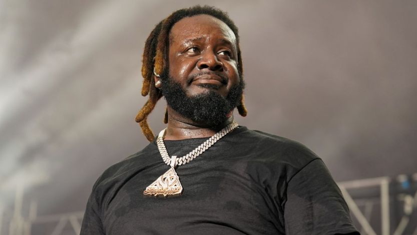 T-Pain scowling on stage