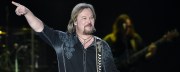 “Here’s a Quarter, Call Someone Who Cares”: The Exaggerated Feud Between Billy Ray Cyrus and Travis Tritt