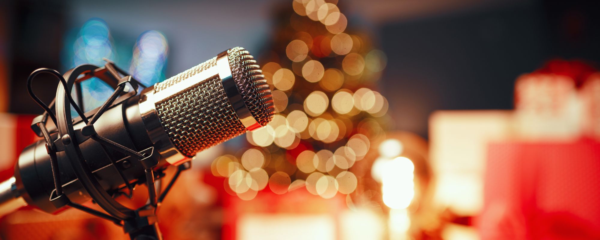 Radio mic with Christmas decorations in back