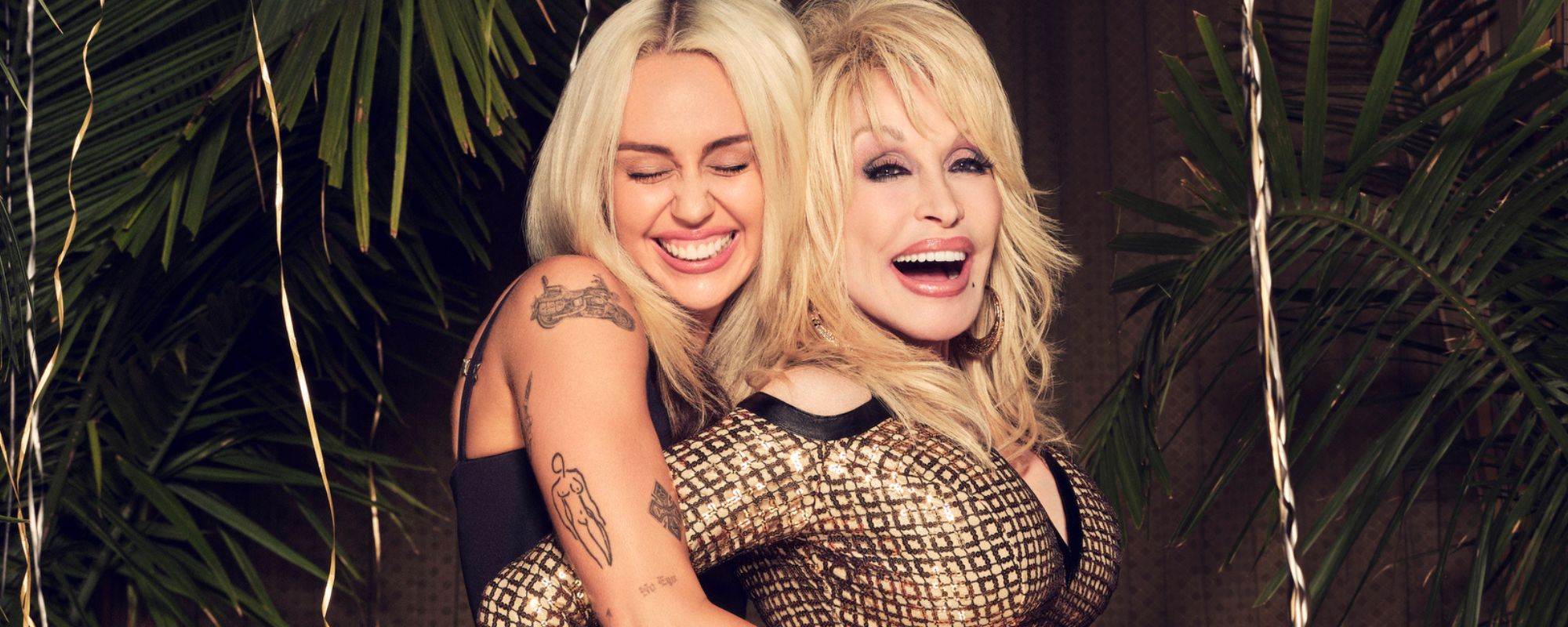Miley Cyrus hugs Dolly Parton