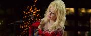 Dolly Parton Enlists Her Sister Rachel to Spread Christmas Cheer, Shares Throwback Photo Dressed in Santa Jumpsuit