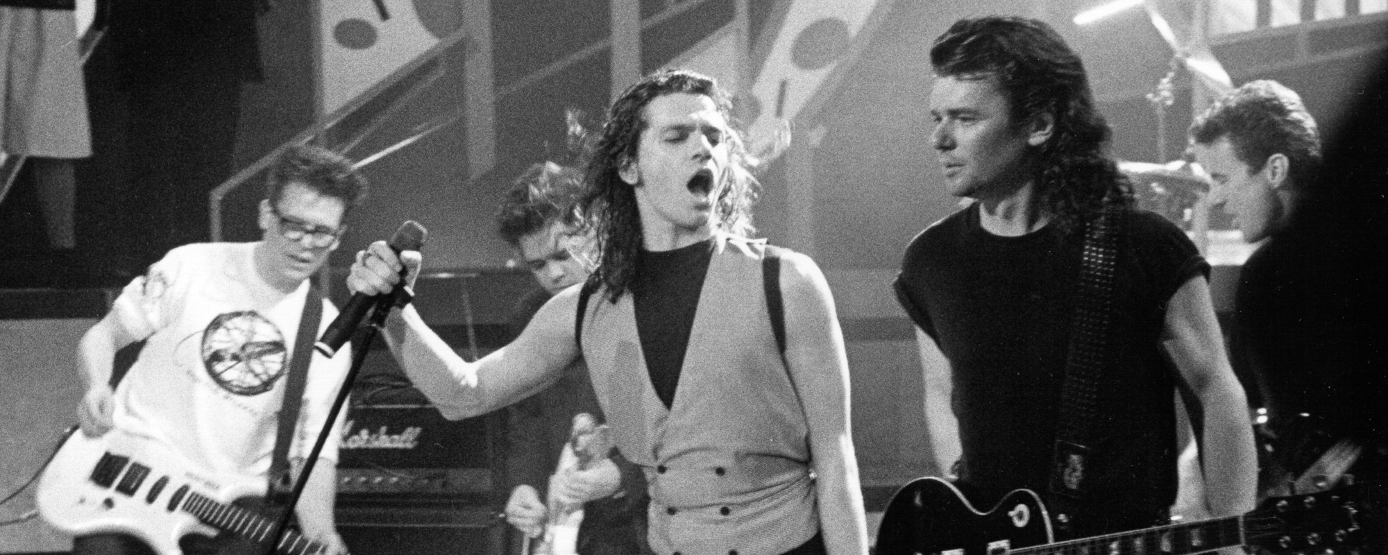 How INXS’ Two Songwriters Met in the Middle on “Devil Inside”