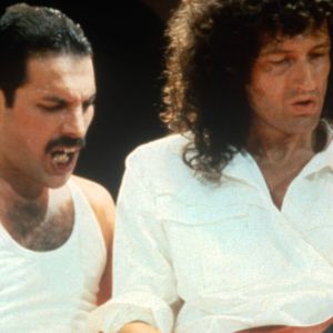 Freddie Mercury and Brian May of Queen performing