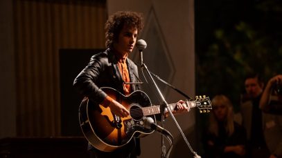 timothee chalamet as bob dylan with a gibson SJ-200