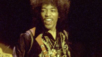 Jimi Hendrix performing