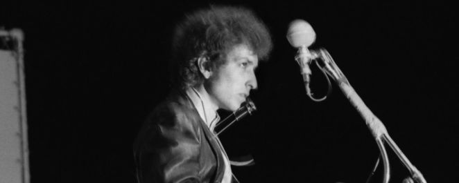 Bob Dylan performing at Newport Folk Festival