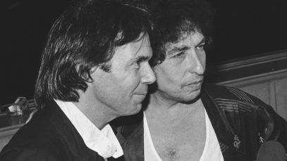 Neil Young and Bob Dylan standing together