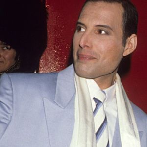 Freddie Mercury waving