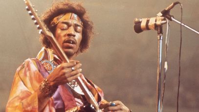 Jimi Hendrix performing