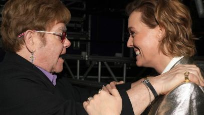 Elton John and Brandi Carlile embrace