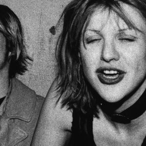 Kurt Cobain and Courtney Love sitting together