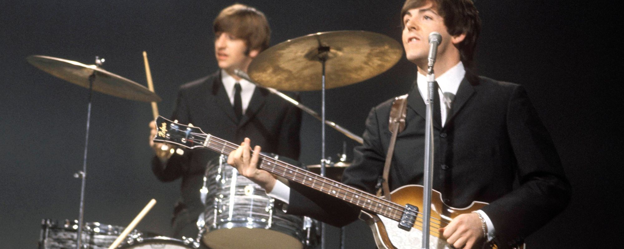 Paul McCartney and Ringo Starr playing bass and drums, respectively