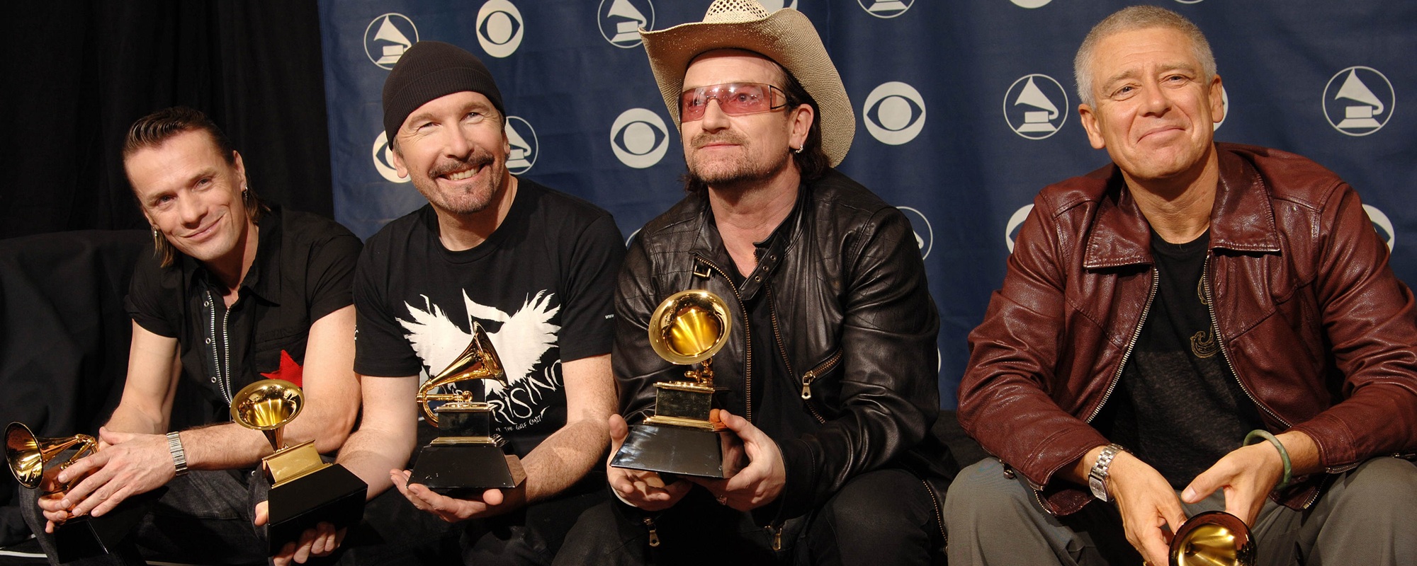 The members of the group U2 (L to R) Lar