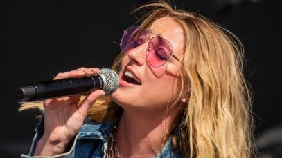 "We're Back Baby:" Ingrid Andress Makes Triumphant National Anthem Return After Viral Home Run Derby Performance