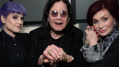Kelly, Ozzy, and Sharon Osbourne pose together