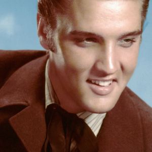 Elvis Presley posing for photo