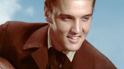 Elvis Presley posing for photo