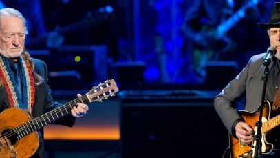 Willie Nelson and Merle Haggard performing