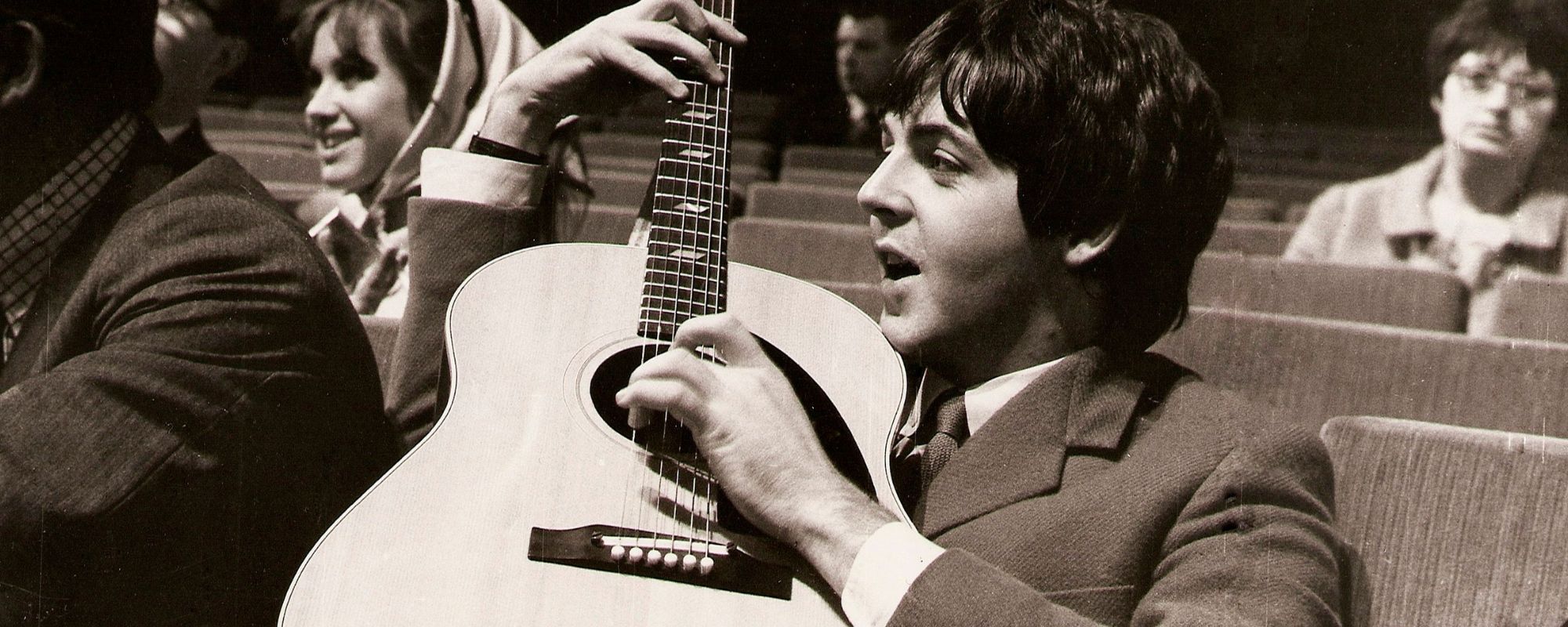 Paul McCartney playing guitar
